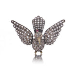 Victorian 12kt Gold and Silver Bird Brooch with Rose Cut Diamonds and Ruby Eyes
