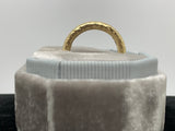 Two matched 14ct gold hammered bands