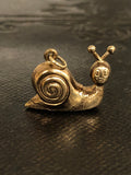 Three 9ct Gold Charms: Snail, Pig, I Love You Spinner