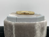 Two matched 14ct gold hammered bands