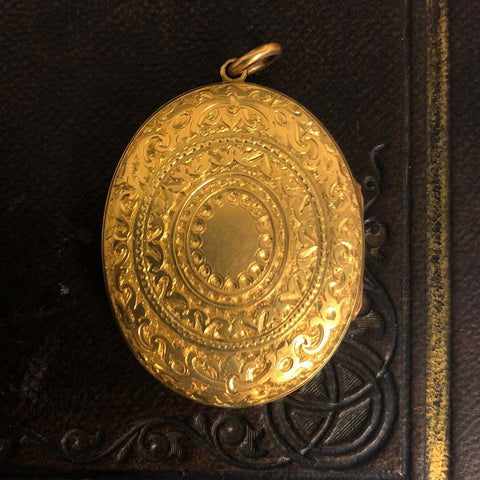 18ct locket and 18kt 19th century pearl ring