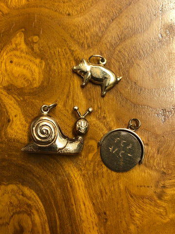 Three 9ct Gold Charms: Snail, Pig, I Love You Spinner