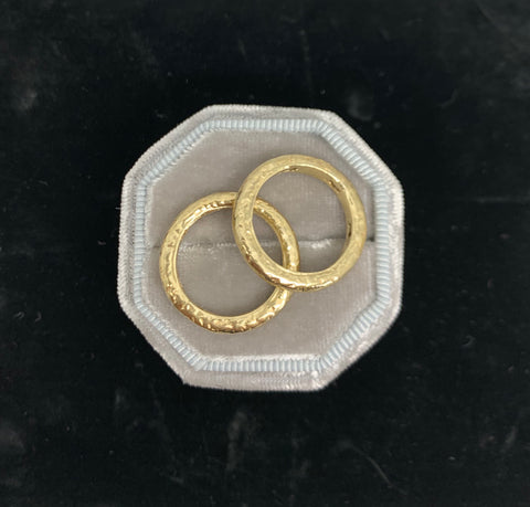 Two matched 14ct gold hammered bands
